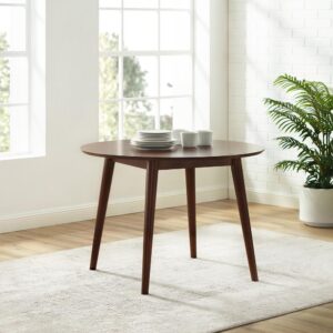 Make casual dining chic and cozy with the Landon Round Dining Table. Taking cues from mid-century modern design