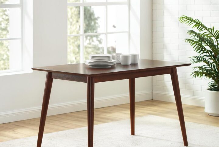 Up your casual dining game with the chic and stylish Landon Dining Table. Taking cues from mid-century modern design
