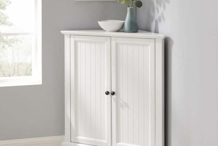 The Shoreline Stackable Corner Pantry provides space-saving organization with a dash of coastal flair. Featuring an adjustable shelf and charming beadboard details on the doors