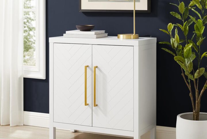 Elevate your at-home storage with the stunning style of the Darcy Accent Cabinet. Great for organizing smaller spaces