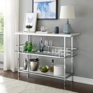 the Aimee Bar is an eye-catching addition to any home. The steel frame and tempered glass shelves create an open silhouette that works as a bar or console table. With its faux marble top