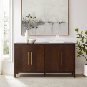 this sideboard can provide traditional dining room storage or function as a media cabinet for a multi-purpose room. Each door showcases a bold herringbone pattern and oversized hardware