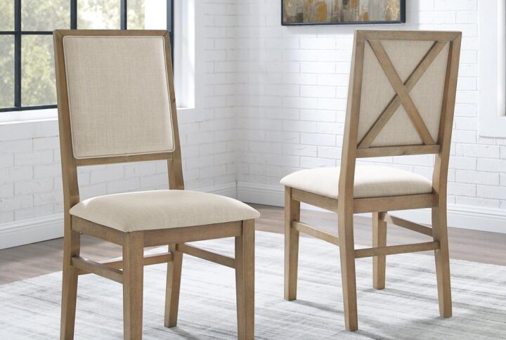 The rustic elegance of the Joanna 2pc Upholstered Chair Set adds farmhouse charm to your kitchen or dining room. Along with the upholstered back and seat