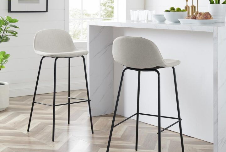 The Riley 2pc Bar Stool Set combines modern and industrial aesthetics