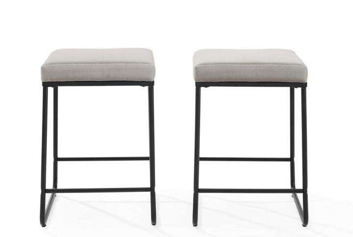 Every hour is "cocktail hour" with the chic silhouette of the Beckett Counter Stool Set. Featuring a streamlined sled base and a plush velvet seat