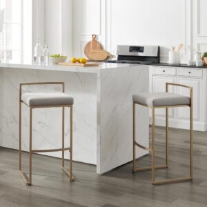the Harlowe 2pc Bar Stool Set offers contemporary flair without sacrificing comfort. Featuring a sleek modern base and footrest with a plush velvet seat