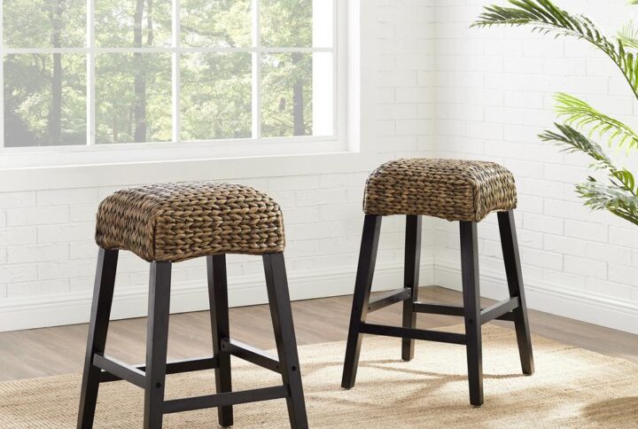 Add texture and warmth to your dining room or kitchen with the Edgewater 2pc Backless Counter Stool Set. With a seat covered in beautiful woven seagrass
