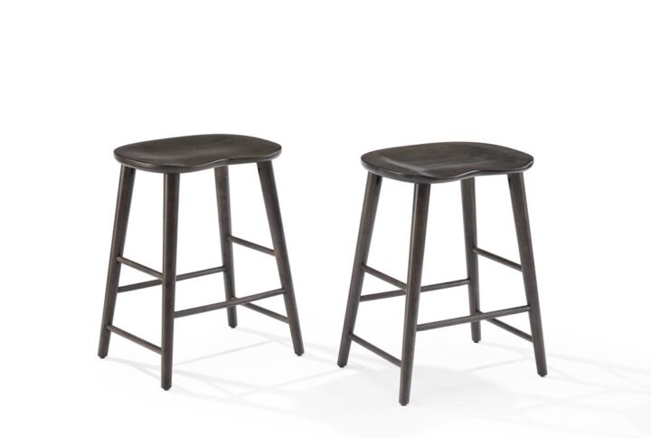 The Maddox 2-piece stool set adds style to any breakfast bar or a counter height dining table. Enjoy a cup of coffee in the morning or a meal in the evening perched on the contoured wood stool seats. This counter height bar stool set adds flair and functionality to your kitchen or dining room.
