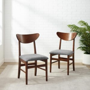 Landon Wood Dining Chairs evoke a simplicity of years gone by. With tapered legs and a distinctive mid-century modern back