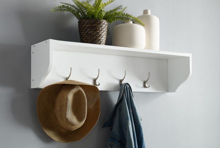 Keep your entryway floor clutter-free with the Harper Entryway Shelf. Four classic double hooks offer hanging storage for coats
