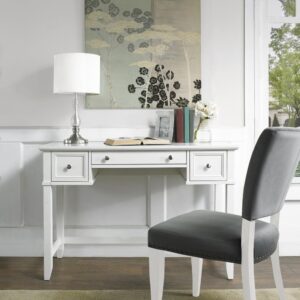 the elegant silhouette of the Vista Desk complements a variety of decor.  With a spacious workspace and three easy glide drawers