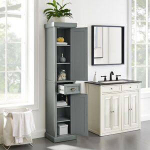 the Seaside Tall Linen Cabinet features a slender profile perfect for small spaces. Both cabinets feature doors with beadboard paneling for a classic coastal look and open to reveal two adjustable shelves. A full-extension drawer sits in-between the cabinets