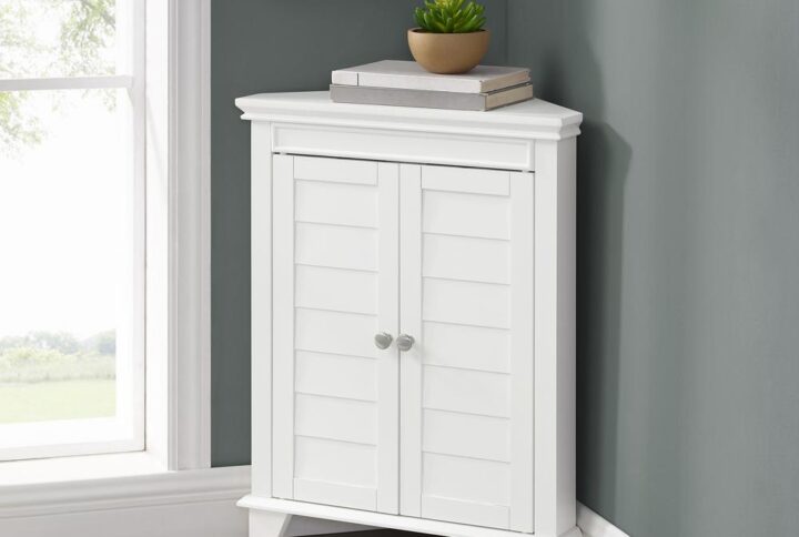The Lydia Corner Cabinet will be a welcome addition to your home with its space-saving design. Easily nestled in the corner of your bathroom or entryway