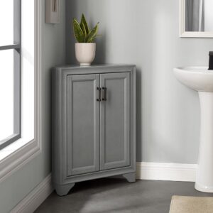 this cabinet easily nestles into the corner of a bathroom or entryway. With two adjustable shelves inside you can store a variety of small items like hand towels and toiletries. Great for smaller spaces