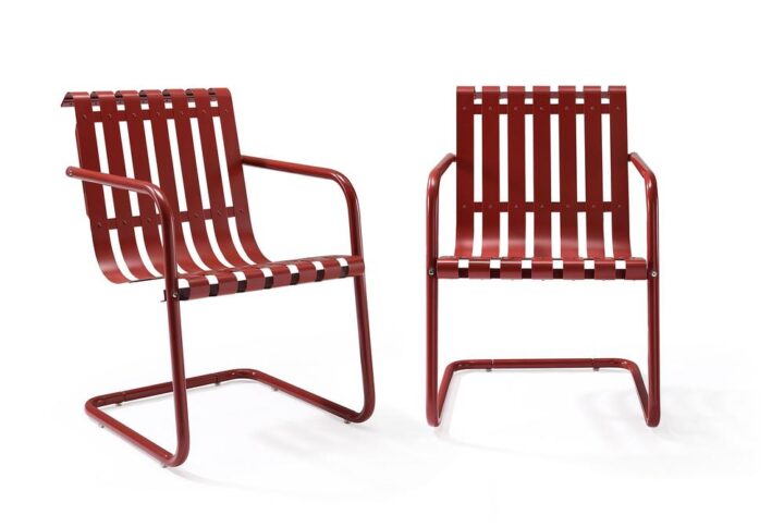 Prepare to be swept back in time with the Gracie Patio Chairs (Set of 2). These unique chairs have a retro slatted design and use a cantilevered base that allows just enough flex for lounging in comfort. Made of durable steel