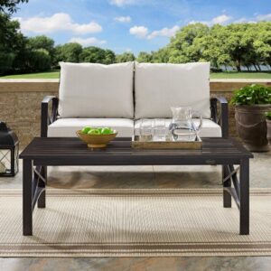 this outdoor table has a versatile design that pairs with a variety of outdoor seating. Classic X design on sides and a slatted tabletop will make the Kaplan Coffee Table a perfect centerpiece for your patio or deck.
