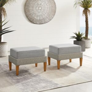 Prop up your feet and relax with the laid-back Cali vibe of the Capella 2pc Ottoman Set. Blending cool neutral tones with natural finishes