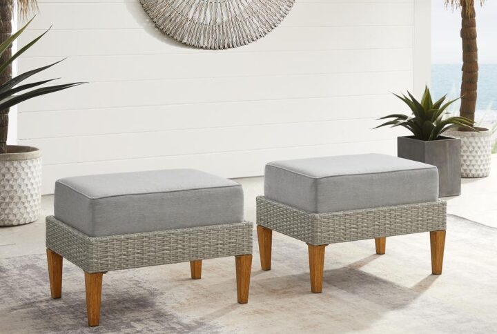 Prop up your feet and relax with the laid-back Cali vibe of the Capella 2pc Ottoman Set. Blending cool neutral tones with natural finishes