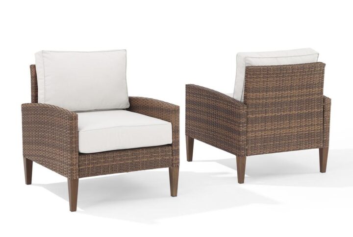 Prepare to lounge and chat away in the Capella Patio Chairs (Set of 2). Blending cool neutral tones with natural finishes