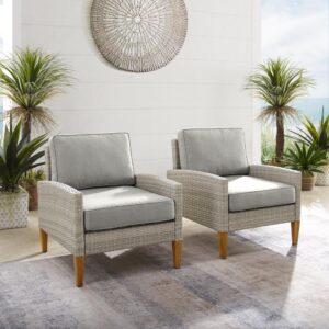 Prepare to lounge and chat away in the Capella Patio Chairs (Set of 2). Blending cool neutral tones with natural finishes