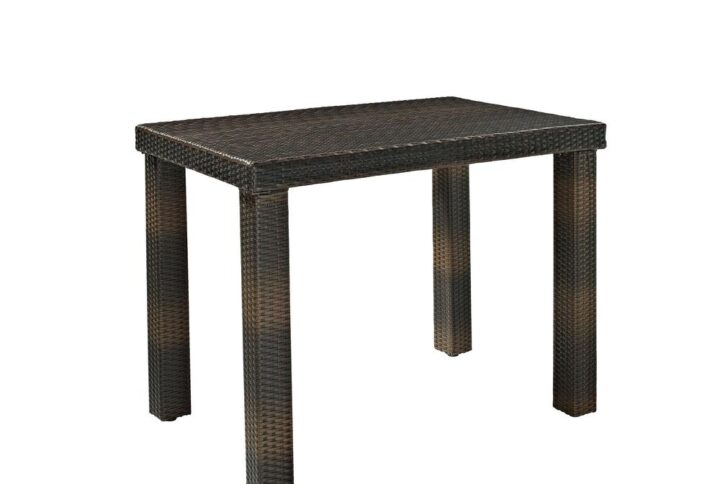 Make outdoor dining feel like a vacation retreat with the all-weather wicker Palm Harbor High Dining Table. With intricately woven wicker over a durable steel frame