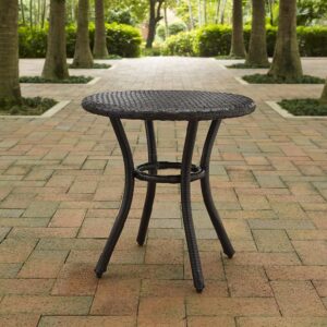 the Palm Harbor Round Side Table easily nestles into a variety of seating arrangements. Wrapped in all-weather resin wicker