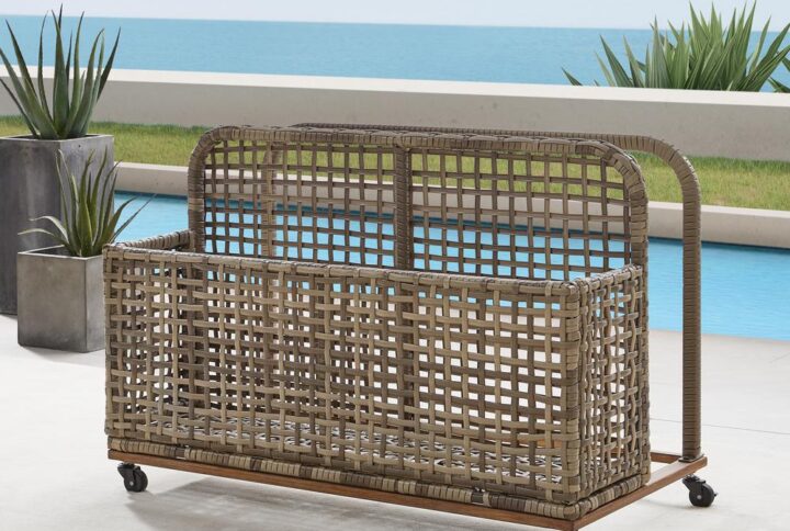 Keep your patio or deck free of clutter with the Ridley Pool Storage Caddy. Made from all-weather resin wicker over powder-coated steel