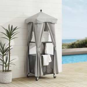 the towel caddy can move wherever it's needed. The open shelf keeps dry towels close at hand