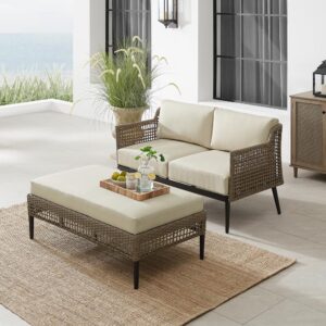 this loveseat and coffee table ottoman feature beautiful resin wicker handwoven over durable steel frames. For added comfort
