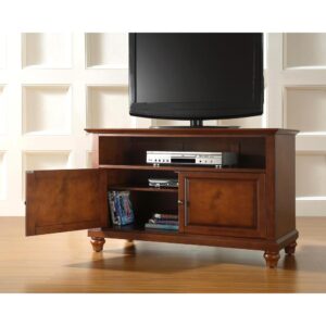 the Cambridge 42” TV Stand can accommodate most flat-panel TVs up to 43-inches. Featuring a large cabinet with double doors and an adjustable shelf