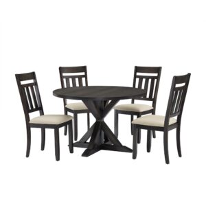 the Hayden 5pc Round Dining Set brings rustic style to family gatherings. The large round table top can comfortably accommodate four diners for a casual family meal. With intersecting legs