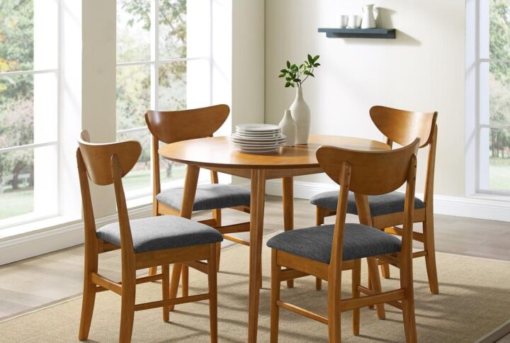 The Landon 5pc Dining Set is a lovely combination of form and function. Inspired by mid-century modern design