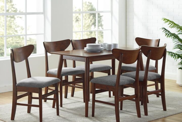 Make casual dining a chic and stylish affair with the Landon 7pc Dining Set. Taking cues from mid-century modern design