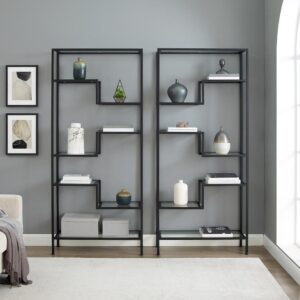 this etagere set's sculptural steel frame features sturdy tempered glass shelves. With variable shelf heights in an Art Deco design