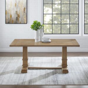 this trestle table will be your go-to for large family gatherings. The substantial rectangle tabletop is enhanced by large pedestal columns with decorative trim on the trestle base. Ready to be the focal point of your dining room