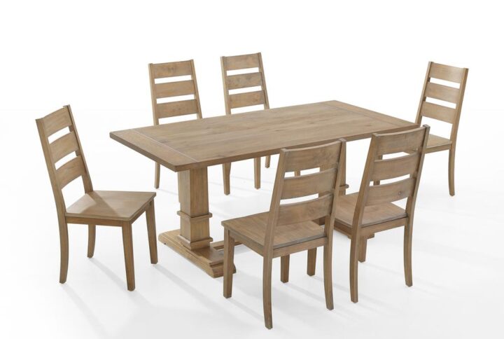 Indulge in the laid-back style of modern farmhouse design with the Joanna 7pc Dining Set. The large rectangle trestle table pairs beautifully with the ladder back dining chairs