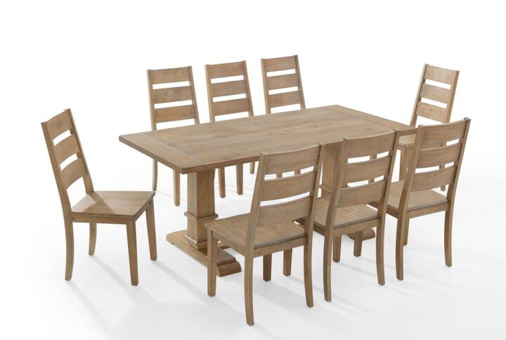 Gather together in modern farmhouse style with the Joanna 9pc Dining Set. The large rectangle trestle table pairs beautifully with the ladder back dining chairs