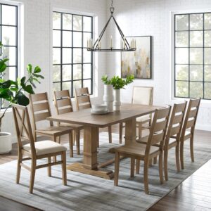 Make your next dinner party a stylish affair with the Joanna 9pc Dining Set. The large rectangle trestle table pairs beautifully with the mix and match ladder back and upholstered chairs. The ladder back chair features wide horizontal slats while the upholstered chairs offer cushioned seats and chair backs with X accents. Balancing the table’s substantial trestle base is a spacious tabletop creating seating for up to eight diners. The Joanna 9pc Dining Set is the ideal spot for a celebration with family and friends.