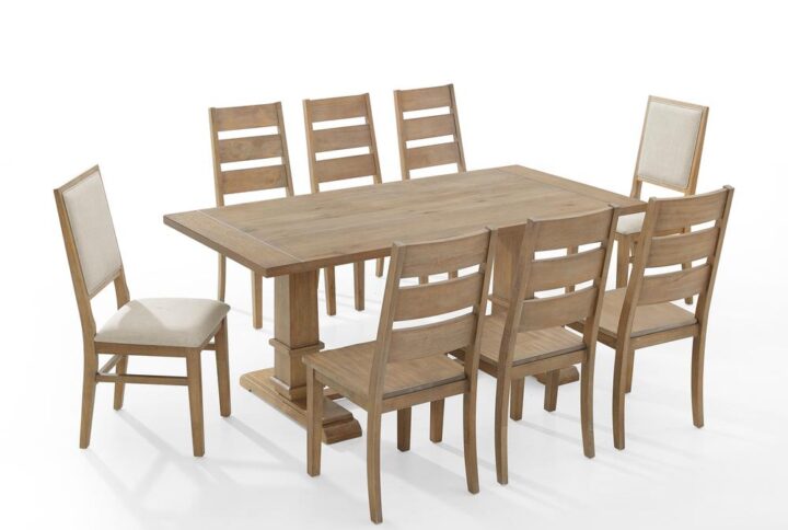 Make your next dinner party a stylish affair with the Joanna 9pc Dining Set. The large rectangle trestle table pairs beautifully with the mix and match ladder back and upholstered chairs. The ladder back chair features wide horizontal slats while the upholstered chairs offer cushioned seats and chair backs with X accents. Balancing the table’s substantial trestle base is a spacious tabletop creating seating for up to eight diners. The Joanna 9pc Dining Set is the ideal spot for a celebration with family and friends.