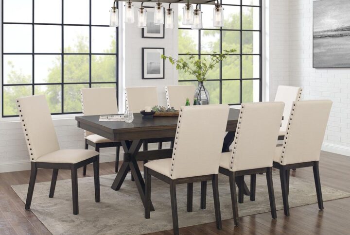 The Hayden 9pc Dining Set brings rustic elegance to family gatherings. Featuring X-shaped legs and a trestle base