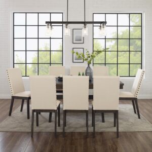 the farmhouse table pairs beautifully with the Parsons style dining chairs. The extendable table's 18” leaf offers space for eight diners