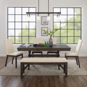 the farmhouse table pairs beautifully with the bench and Parsons style dining chairs. The extendable table's 18” leaf offers space for six diners