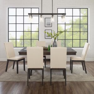 the farmhouse table pairs beautifully with the Parsons style dining chairs. The extendable table's 18” leaf offers space for six diners