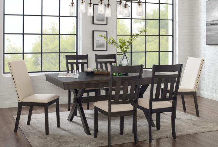 The Hayden 7pc Dining Set brings rustic elegance to family gatherings. Featuring X-shaped legs and a trestle base