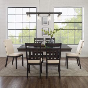 the farmhouse table pairs beautifully with the four slat back and two Parsons style dining chairs. The extendable table's 18” leaf offers space for six diners
