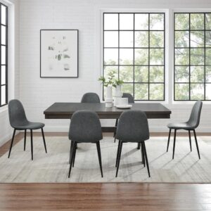 this set delivers an upscale dining experience. The steel tapered legs of the chairs give an unobscured view of the table's unique trestle base. Beautifully crafted to blend rustic and contemporary aesthetics