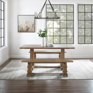 this set has a casual charm perfect for a family meal. The benches echo the design of the trestle table with square pedestal columns and large rectangular seats. With seating for up to six diners