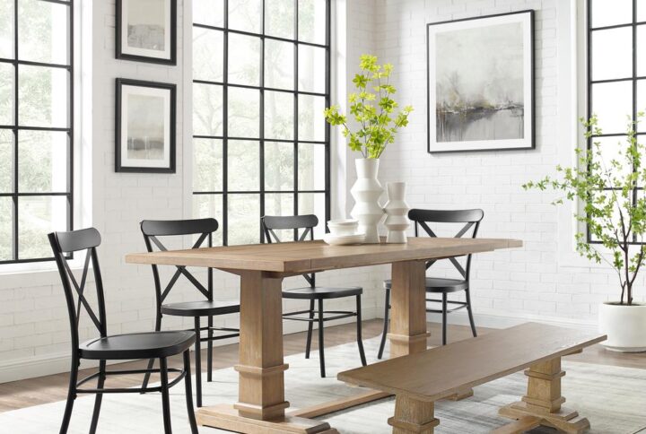 The Joanna 6pc Dining Set with Camille Chairs is where modern farmhouse style meets French industrial chic. Blending rustic wood and sturdy steel