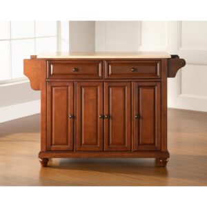 The Cambridge Full-Size Kitchen Island adds enduring style and storage to your kitchen. Featuring three cabinets
