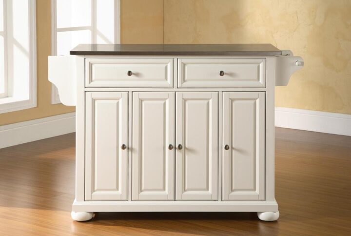 The Alexandria Full-Size Kitchen Island adds enduring style and storage to your kitchen. Featuring three cabinets